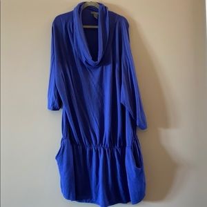 Blue long flared sweater with pockets